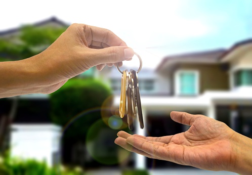 Purchasing property with two hands and key